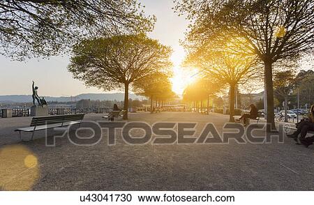 Stock Image - Lake promenade at Burkliplatz with Ganymed Statue, Zurich, Switzerland. Fotosearch