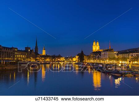Stock Photography - Limmat river, Fraumunster church, Grossmunster church Zurich, Switzerland. Fotosearch