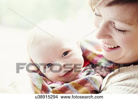 Mother with baby, portrait View Large Photo Image Picture - Mother with baby, portrait. Fotosearch