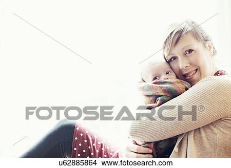 Picture - Mother with baby, portrait. Fotosearch