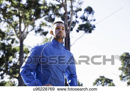 Stock Photo - Portrait of male jogger. Fotosearch
