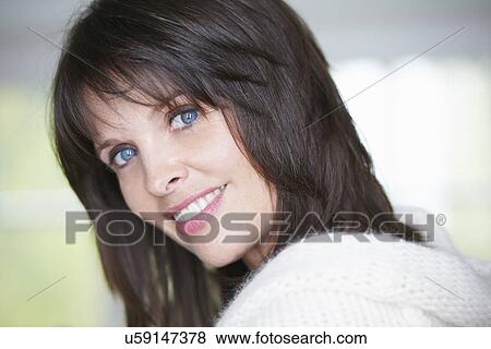 Stock Photo - Portrait of mature woman. Fotosearch