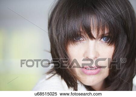 Stock Photography - Portrait of mature woman. Fotosearch