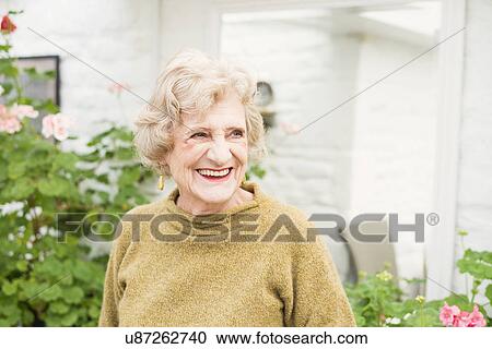 Stock Image - Portrait of senior woman. Fotosearch