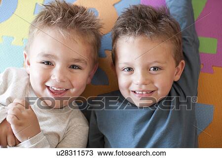 Portrait of two boys at nursery school View Large Photo Image Stock Image - Portrait of two boys at nursery school. Fotosearch
