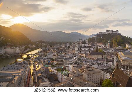 Stock Image - Salzach river, Kollegien Church, Hohensalzburg castle, Salzburg, Austria. Fotosearch