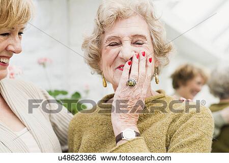 Senior woman with daughter, laughing View Large Photo Image Stock Photograph - Senior woman with daughter, laughing. Fotosearch