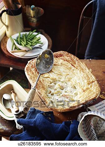 Stock Photography - Snapper leek pie and green beans. Fotosearch