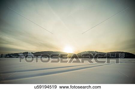 Snow covered landscape at sunset, Russia View Large Photo Image Stock Photo - Snow covered landscape at sunset, Russia. Fotosearch