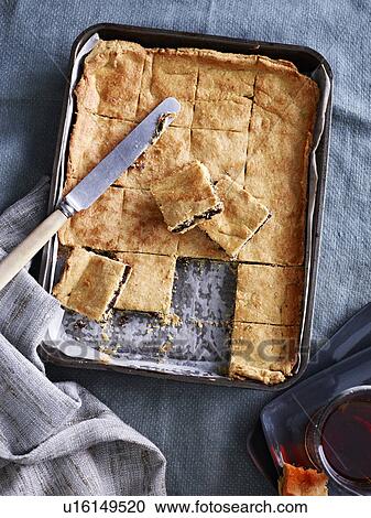 Still life of baking tray with garibaldi slices View Large Photo Image Stock Image - Still life of baking tray with garibaldi slices. Fotosearch