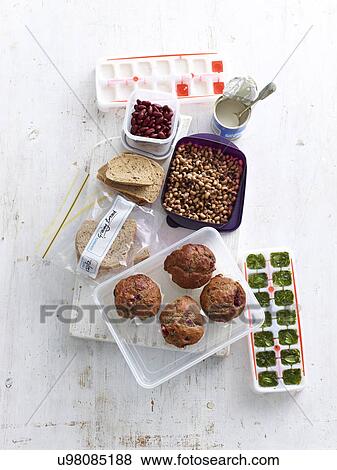 Still life of freezer and storage choices with ice cube trays and freezer bags View Large Photo Image Stock Photo - Still life of freezer and storage choices with ice cube trays and freezer bags. Fotosearch