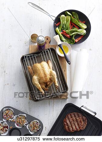 Still life of low fat cooking choices with grilled and stir fried food View Large Photo Image Stock Photography - Still life of low fat cooking choices with grilled and stir fried food. Fotosearch