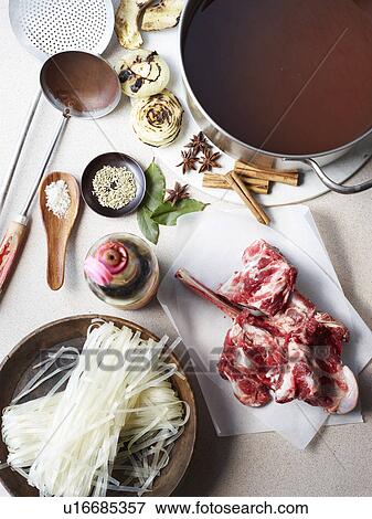 Stock Photo - Still life of pho bo, raw ingredients for vietnamese meal. Fotosearch