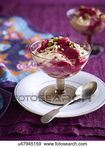 Stock Photo - Still life of rhubarb custard dessert. Fotosearch