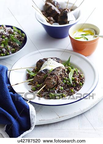 Still life of turkey kofta with peas, mint and yogurt View Large Photo Image Stock Image - Still life of turkey kofta with peas, mint and yogurt. Fotosearch