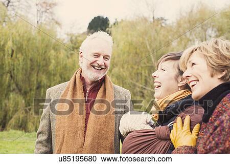 Three generation family laughing View Large Photo Image Stock Image - Three generation family laughing. Fotosearch
