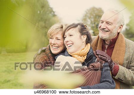 Three generation family smiling View Large Photo Image Stock Image - Three generation family smiling. Fotosearch