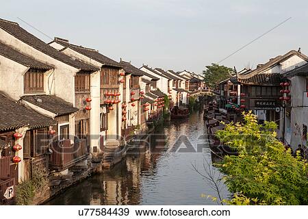 Traditional waterfront houses on river, Suzhou, Jiangsu Province, China View Large Photo Image Stock Photo - Traditional waterfront houses on river, Suzhou, Jiangsu Province, China. Fotosearch