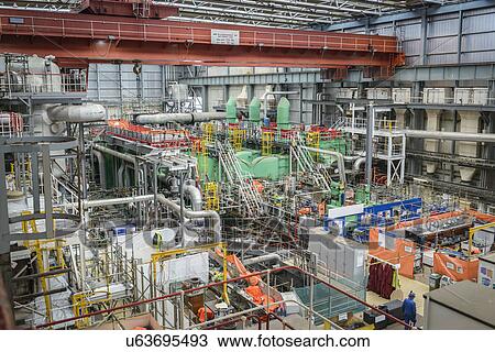 Turbine hall in repair during power station outage, high angle view View Large Photo Image Stock Image - Turbine hall in repair during power station outage, high angle view. Fotosearch
