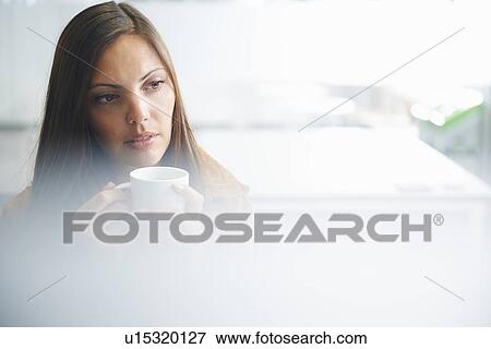 Woman taking coffee break View Large Photo Image Stock Photo - Woman taking coffee break. Fotosearch