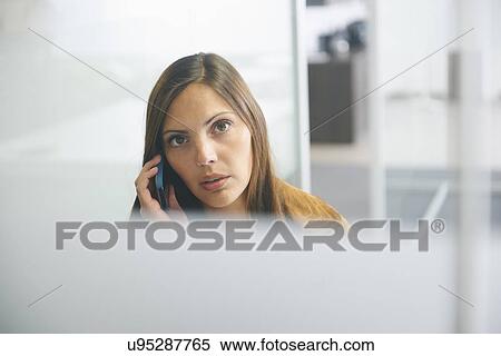 Stock Photography - Woman using smartphone. Fotosearch