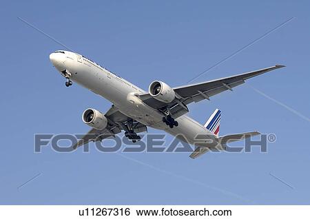 Air France Boeing 777-300ER landing at Los Angeles International Airport View Large Photo Image Stock Photograph - Air France Boeing 777-300ER landing at Los Angeles International Airport. Fotosearch