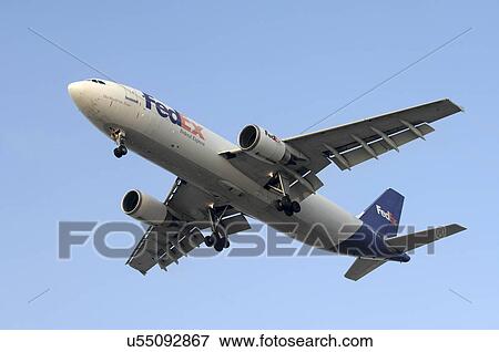 Stock Photo - Airbus A300F4 of FedEx on final approach to Los Angeles International Airport. Fotosearch