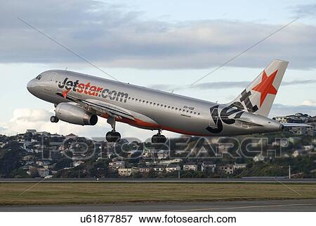 Stock Photo - Airbus A320 of Jetstar taking off from Wellington Airport. Fotosearch