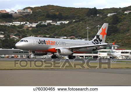 Stock Photography - Airbus A320 of Jetstar taking off from Wellington Airport. Fotosearch