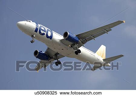 Stock Photography - Airbus A320 of Ted United Airlines on final approach to Los Angeles International Airport. Fotosearch