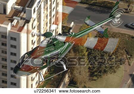 Bell 407 helicopter over Johannesburg View Large Photo Image Stock Image - Bell 407 helicopter over Johannesburg. Fotosearch