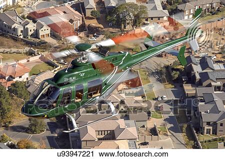 Bell 407 helicopter over Johannesburg, South Africa View Large Photo Image Stock Image - Bell 407 helicopter over Johannesburg, South Africa. Fotosearch