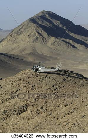Bell Huey II on a mountain top near Kandahar, Afghanistan View Large Photo Image Stock Image - Bell Huey II on a mountain top near Kandahar, Afghanistan. Fotosearch