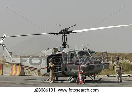 Bell Huey II preparing for mission; Kabul, Afghanistan View Large Photo Image Stock Image - Bell Huey II preparing for mission; Kabul, Afghanistan. Fotosearch
