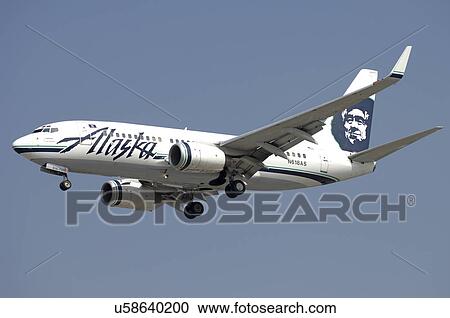 Stock Image - Boeing 737-700 of Alaska Airlines on final approach to Los Angeles International Airport. Fotosearch