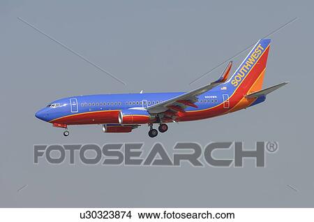 Boeing 737-700 of Southwest Airlines on final approach to Los Angeles International Airport View Large Photo Image Picture - Boeing 737-700 of Southwest Airlines on final approach to Los Angeles International Airport. Fotosearch