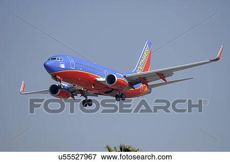 Boeing 737-700 of Southwest Airlines on final approach to Los Angeles International Airport View Large Photo Image Stock Photo - Boeing 737-700 of Southwest Airlines on final approach to Los Angeles International Airport. Fotosearch