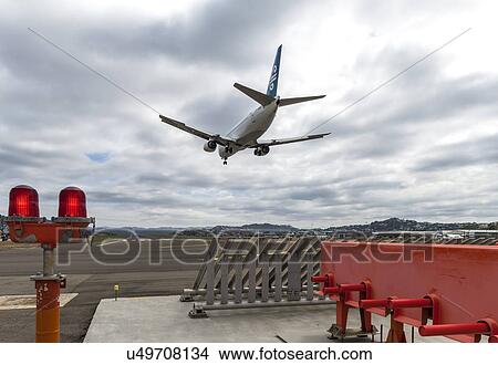 Boeing 737 landing at Wellington Airport View Large Photo Image Picture - Boeing 737 landing at Wellington Airport. Fotosearch