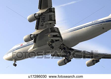 Stock Image - Boeing 747-400 Combi of Air China landing at Los Angeles International Airport. Fotosearch