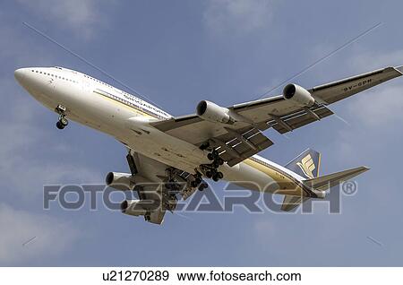 Stock Photo - Boeing 747-400 of Singapore Airlines on final approach for Los Angeles International Airport. Fotosearch
