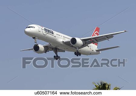Picture - Boeing 757-200 of Northwest Airlines on final approach to Los Angeles International Airport. Fotosearch