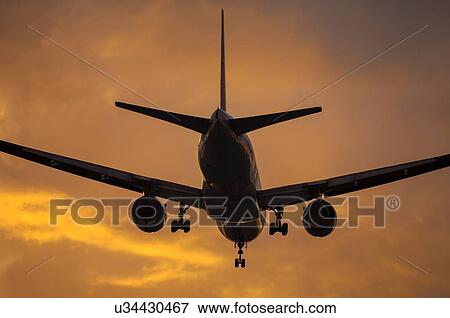 Stock Photo - Boeing 777 landing at Los Angeles International Airport. Fotosearch