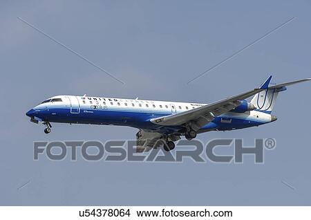 Bombardier CL-600 of United Express on final approach for Los Angeles International Airport View Large Photo Image Picture - Bombardier CL-600 of United Express on final approach for Los Angeles International Airport. Fotosearch