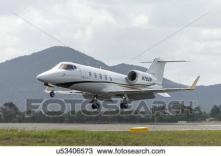 Stock Image - Bombardier Learjet 60XR landing at Avalon Airport. Fotosearch