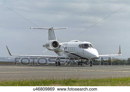 Stock Photo - Bombardier Learjet 60XR landing at Avalon Airport. Fotosearch