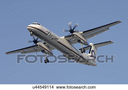Picture - Bombardier Q400 of Horizon Airline landing at Los Angeles International Airport. Fotosearch