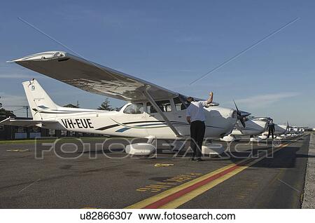 Cessna 172 line-up at flying school View Large Photo Image Stock Photo - Cessna 172 line-up at flying school. Fotosearch