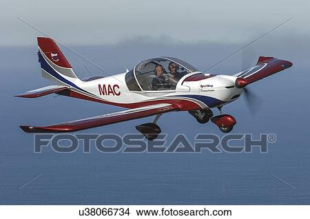 Picture - Evektor-Aerotechnik SportStar light aircraft in flight over North Canterbury. Fotosearch