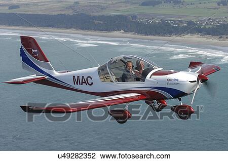 Evektor-Aerotechnik SportStar light aircraft in flight over North Canterbury View Large Photo Image Stock Image - Evektor-Aerotechnik SportStar light aircraft in flight over North Canterbury. Fotosearch