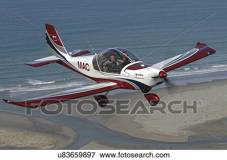 Stock Photo - Evektor-Aerotechnik SportStar light aircraft in flight over North Canterbury. Fotosearch